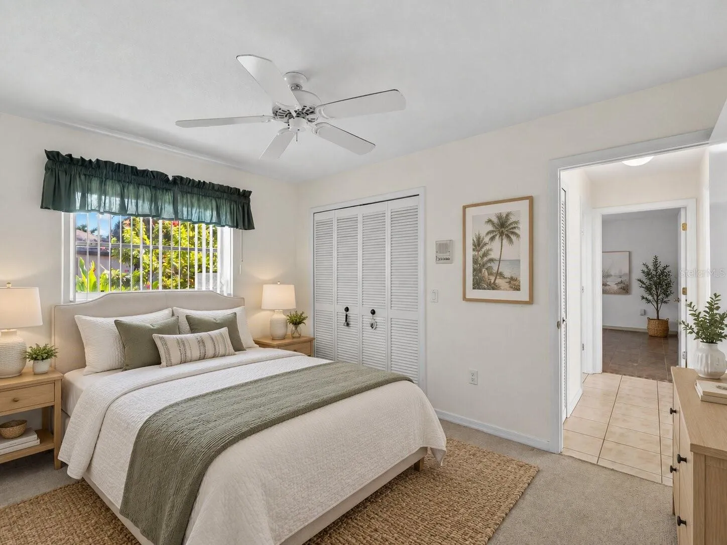 (Staged) PrimarySuite_134TocopillaStreet_PuntaGorda_NaturalLight_Corner.jpg