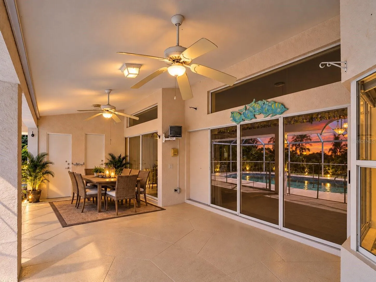 ScreenedLanai_134TocopillaStreet_PuntaGorda_PoolView_SliderView.jpg