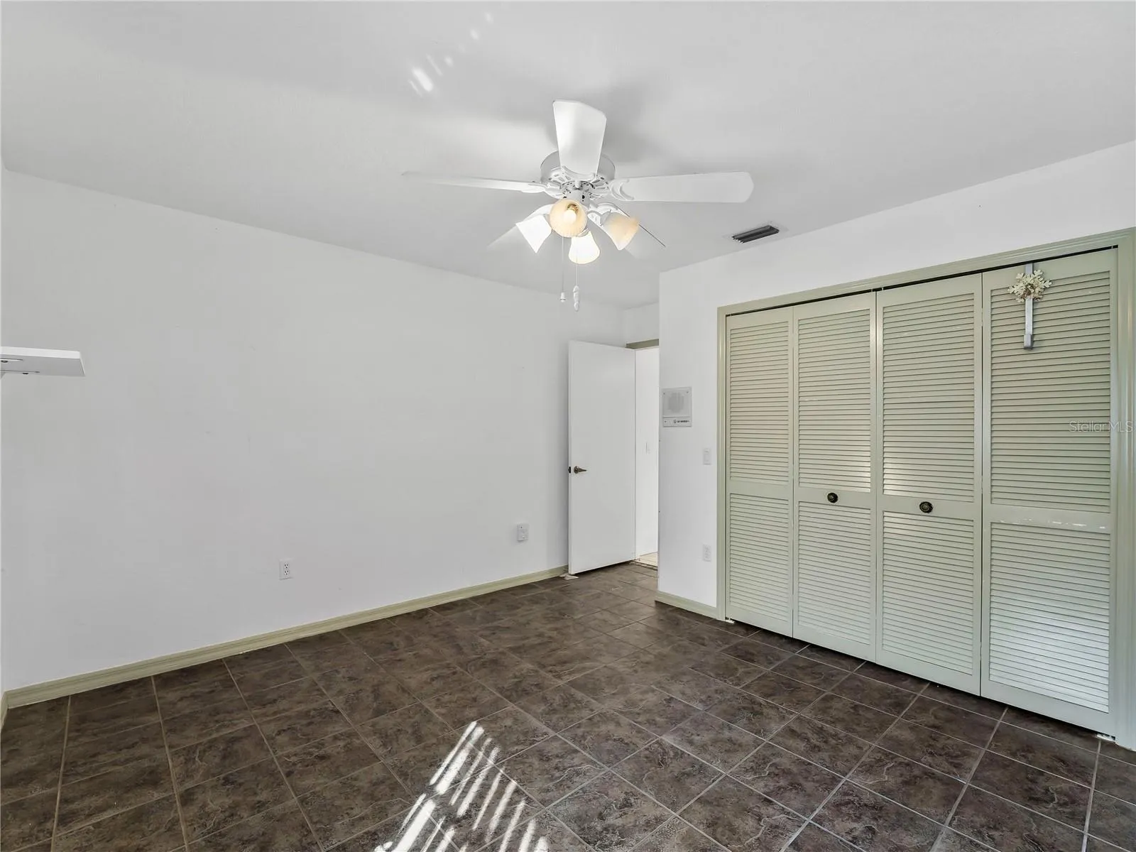 Bedroom_134TocopillaStreet_PuntaGorda_CleanFinish_Entry.jpg