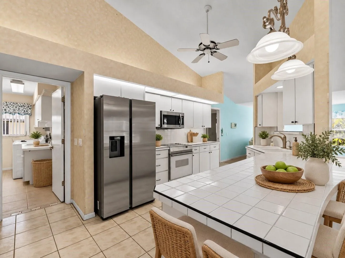 (Staged) Kitchen_134TocopillaStreet_PuntaGorda_QuartzIsland_Corner.jpg