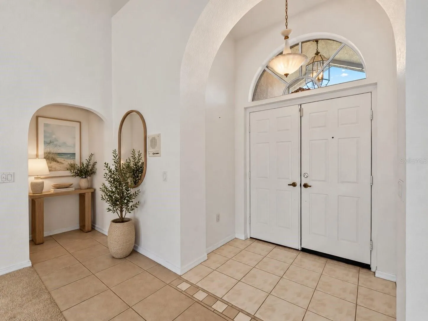 (Staged) Foyer_134TocopillaStreet_PuntaGorda_CleanFinish_Entry.jpg