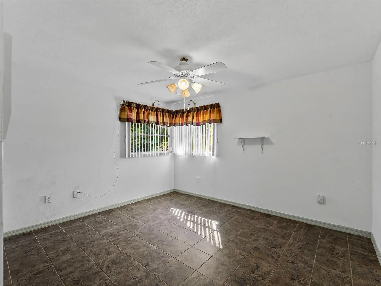 Bedroom_134TocopillaStreet_PuntaGorda_CleanFinish_WindowView.jpg