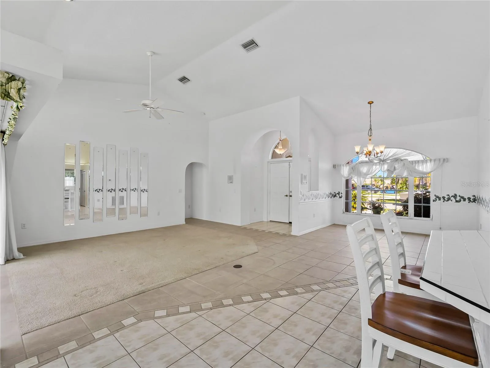 DiningLiving_134TocopillaStreet_PuntaGorda_OpenConcept_Corner.jpg