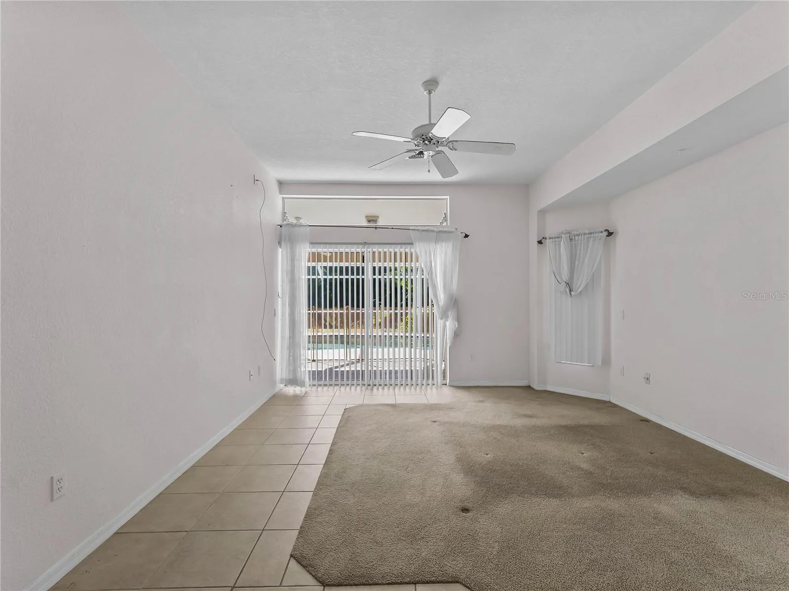 PrimarySuite_134TocopillaStreet_PuntaGorda_TrayCeiling_WindowView.jpg