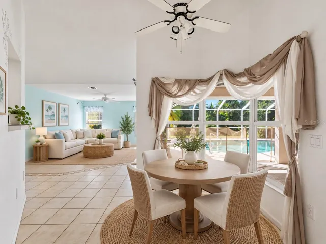 (Staged) BreakfastNook_134TocopillaStreet_PuntaGorda_NaturalLight_WindowView.jpg