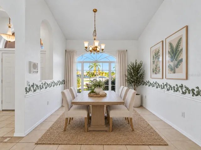 (Staged) DiningRoom_134TocopillaStreet_PuntaGorda_NaturalLight_Daylight.jpg