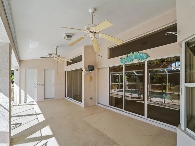 ScreenedLanai_134TocopillaStreet_PuntaGorda_PoolView_SliderView.jpg