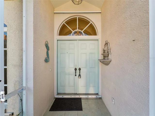 FrontPorch_134TocopillaStreet_PuntaGorda_CoveredEntry_Detail.jpg