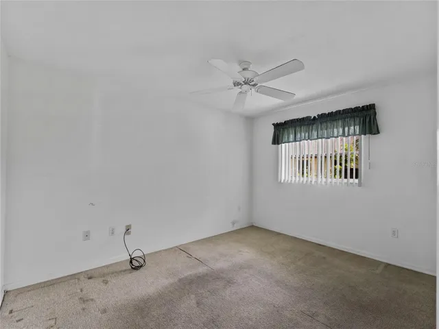Bedroom_134TocopillaStreet_PuntaGorda_NaturalLight_Corner.jpg