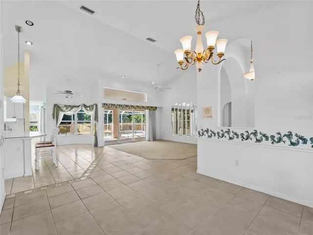 DiningLiving_134TocopillaStreet_PuntaGorda_OpenConcept_SliderView.jpg