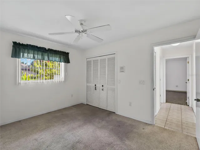 Bedroom_134TocopillaStreet_PuntaGorda_NaturalLight_Entry.jpg
