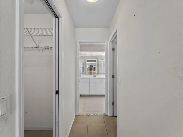 PrimarySuite_134TocopillaStreet_PuntaGorda_WalkInCloset_Entry.jpg