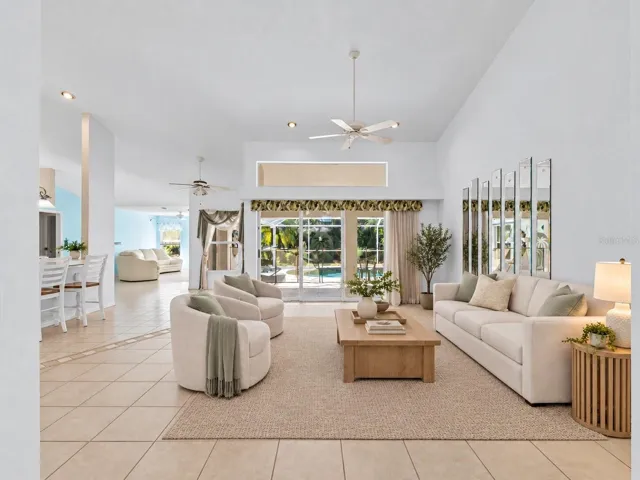 (Staged) GreatRoom_134TocopillaStreet_PuntaGorda_OpenConcept_SliderView.jpg