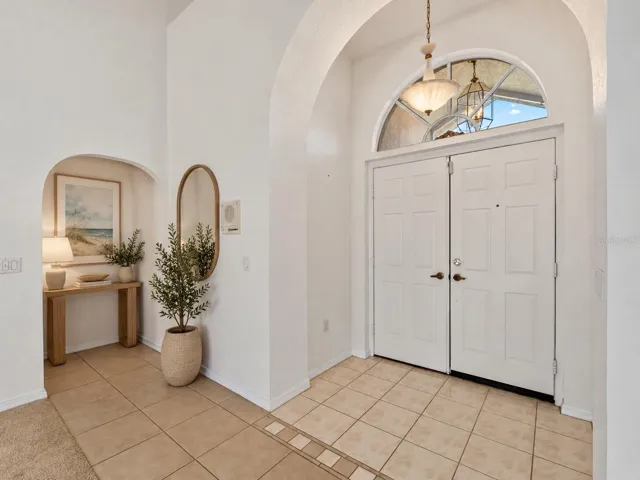 (Staged) Foyer_134TocopillaStreet_PuntaGorda_CleanFinish_Entry.jpg