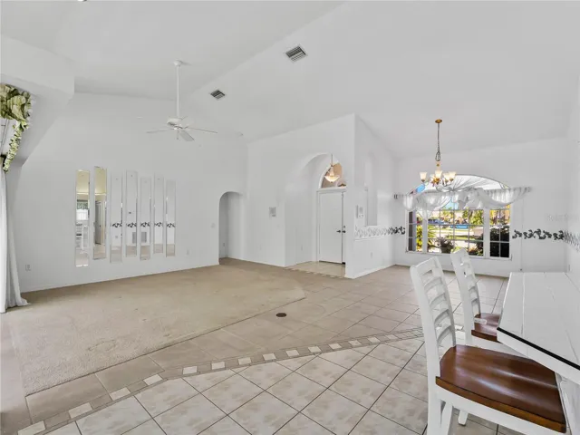 DiningLiving_134TocopillaStreet_PuntaGorda_OpenConcept_Corner.jpg