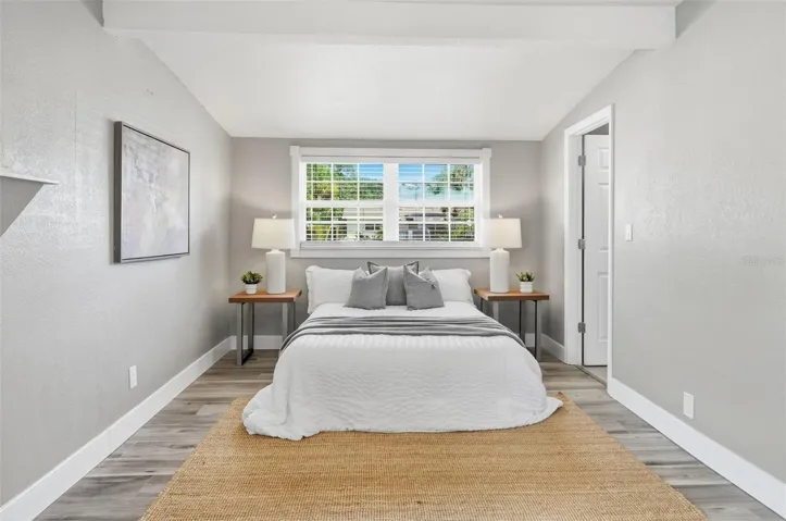 Primary Bedroom with an en-suite and walk-in closet