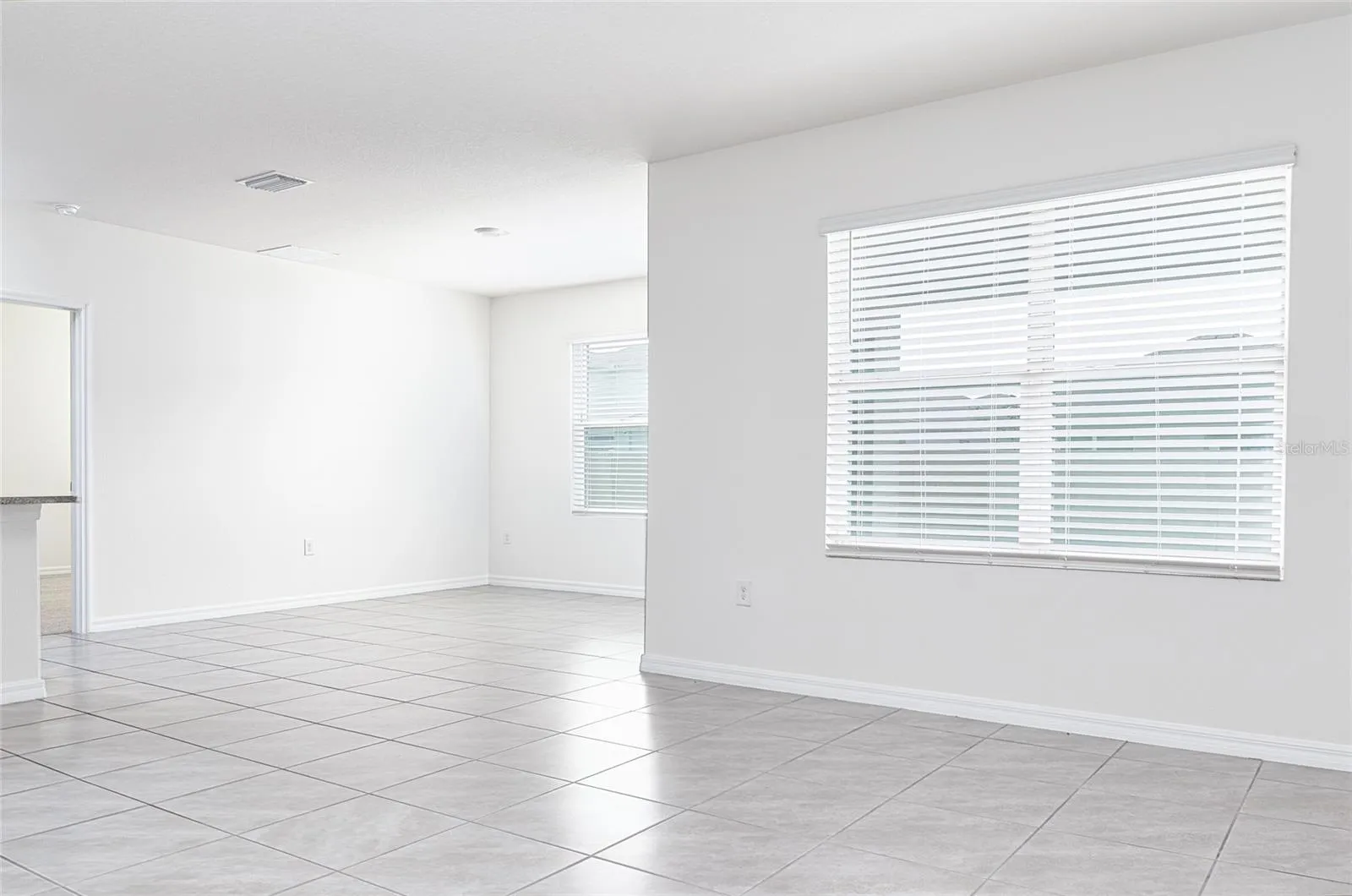 Tiled Flooring Throughout