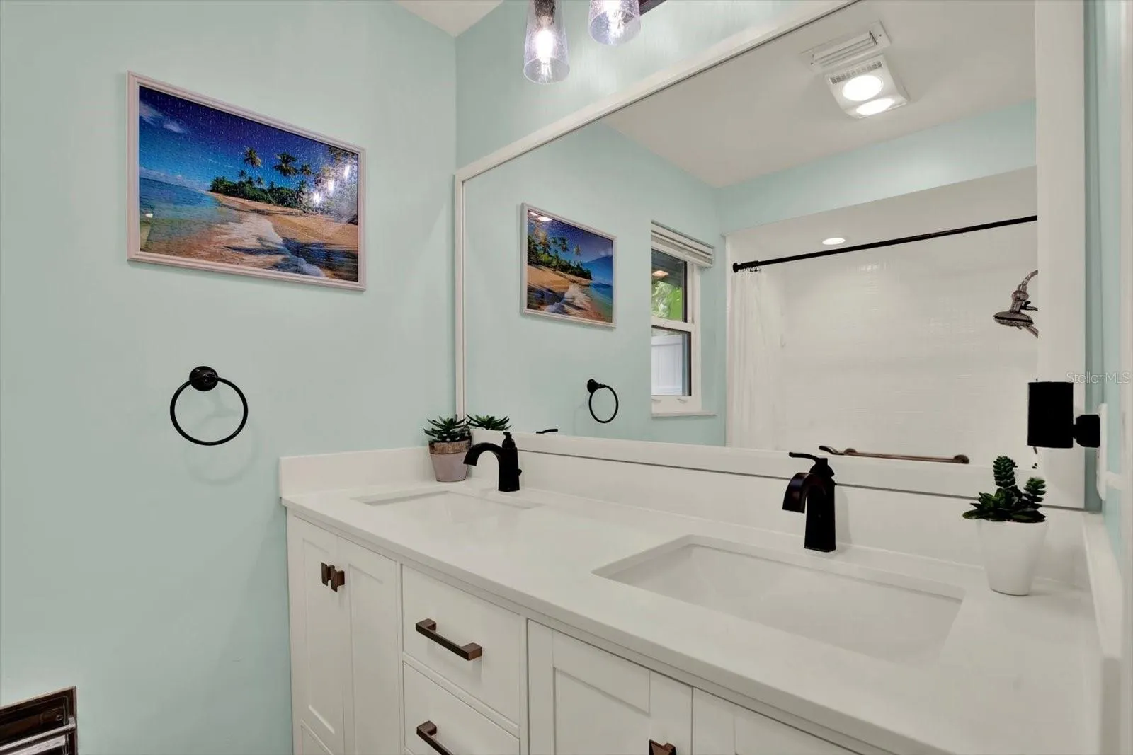 Primary bathroom with dual sink vanity