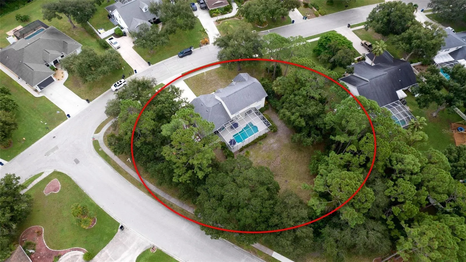 Great aerial view of this large corner lot