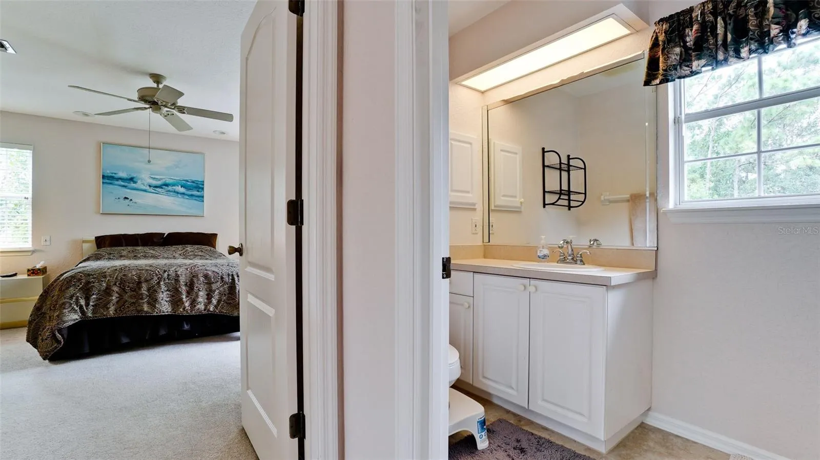 Hall bathroom between primary &amp; 2nd &amp; 3rd bedrooms