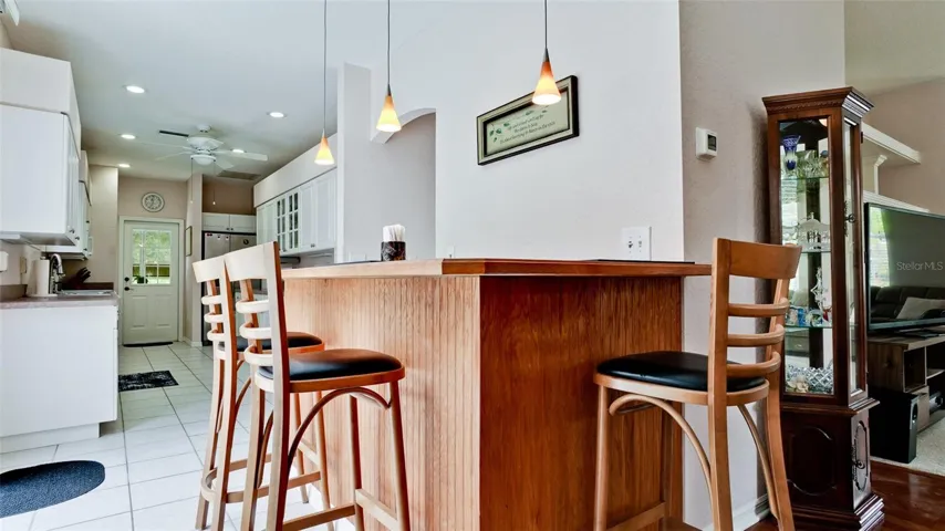 Custom bar between dining area &amp; kitchen