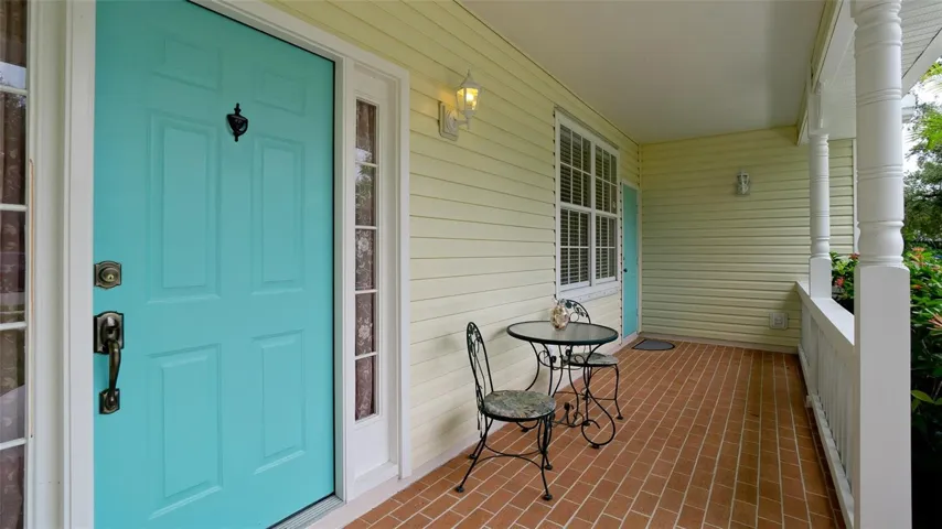 Inviting front porch w/entrance into foyer
