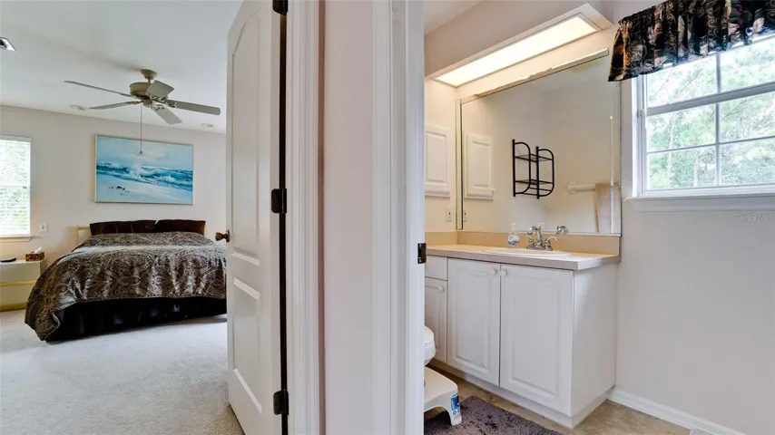 Hall bathroom between primary &amp; 2nd &amp; 3rd bedrooms