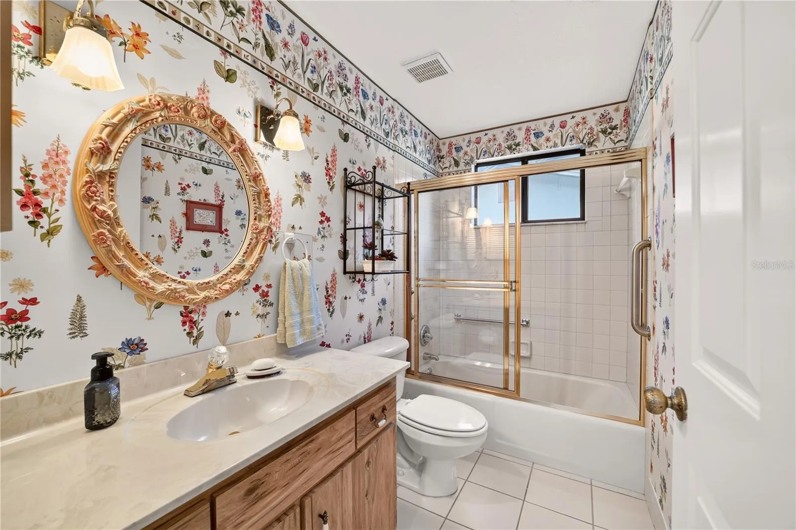 Guest bathroom has shower and tub combo