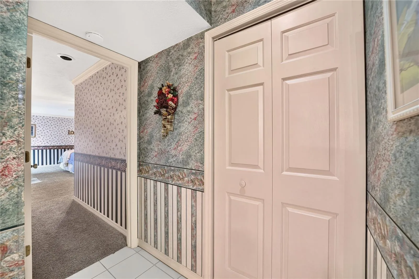 Entry into the primary bedroom. A closet is in the hall which is handy for everything.