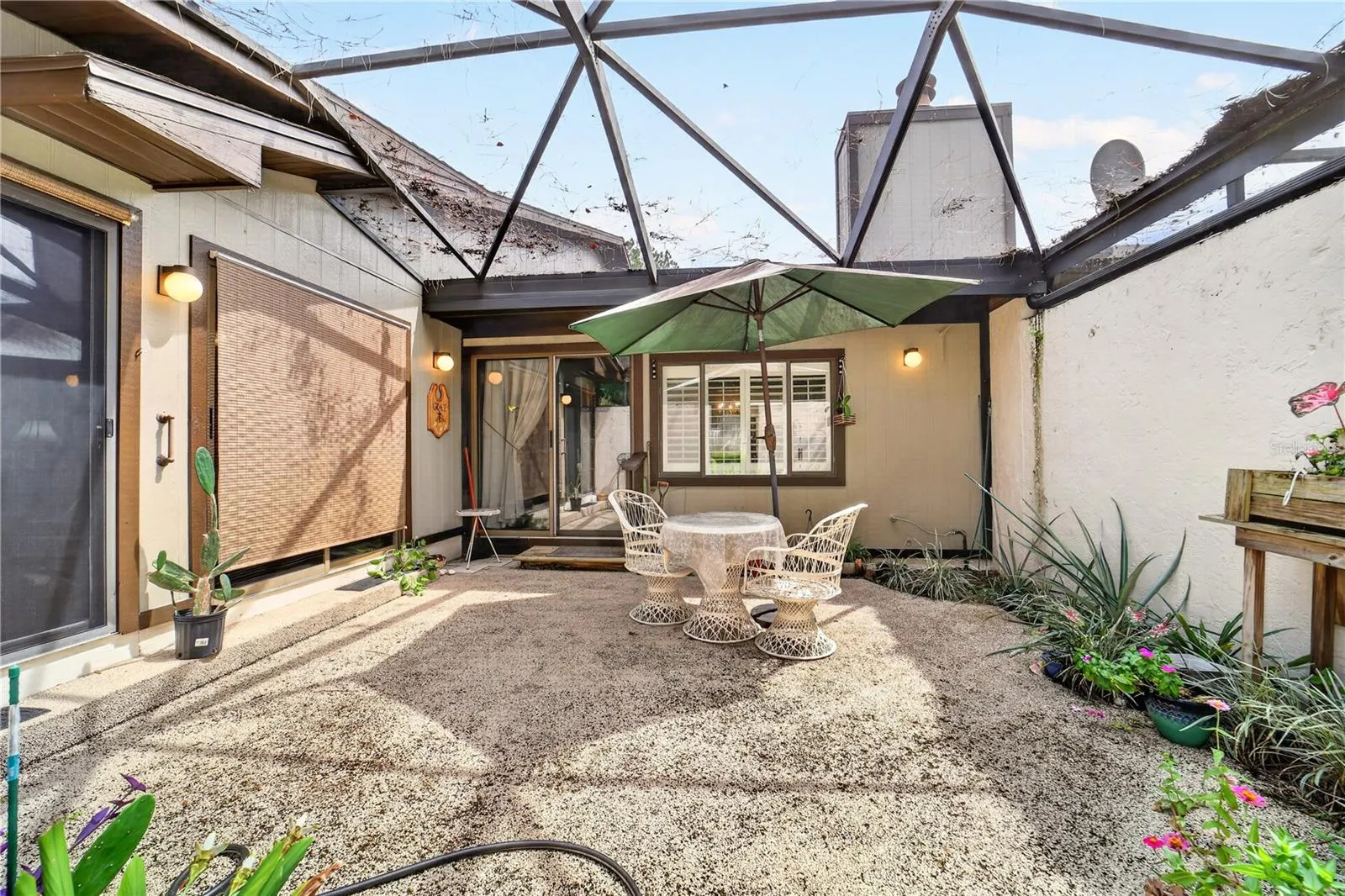 Enjoy the back porch and the gardening options
