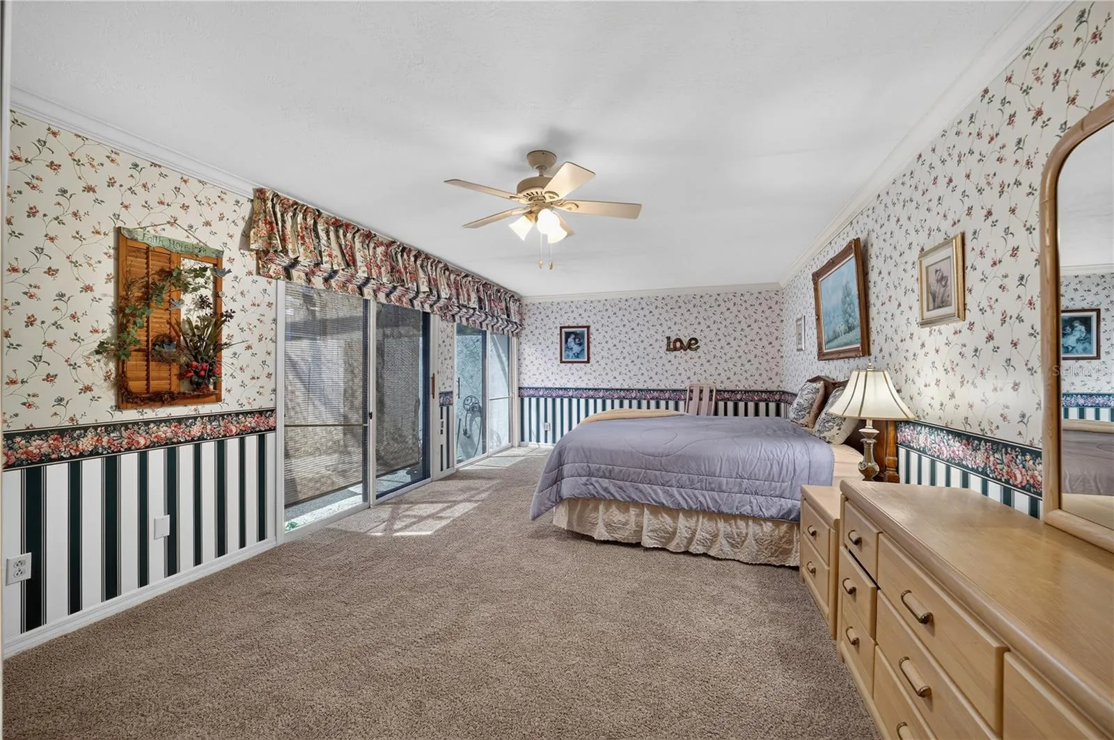 Another view of the primary bedroom