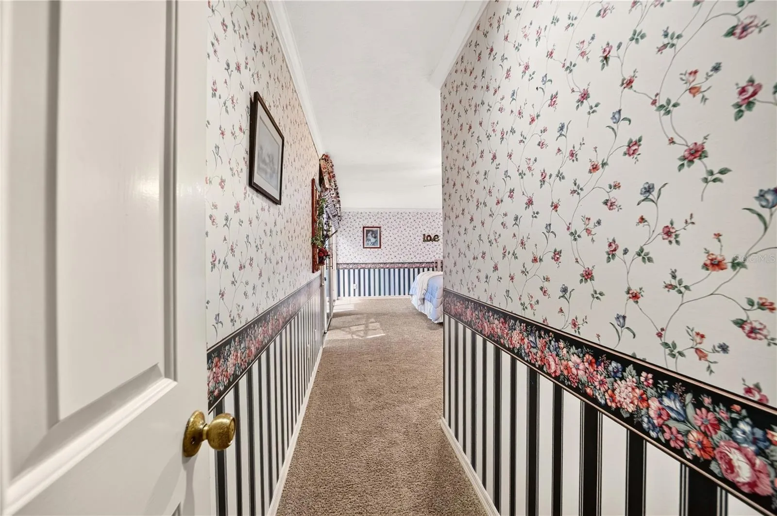 Entry to the primary bedroom offers additional privacy.