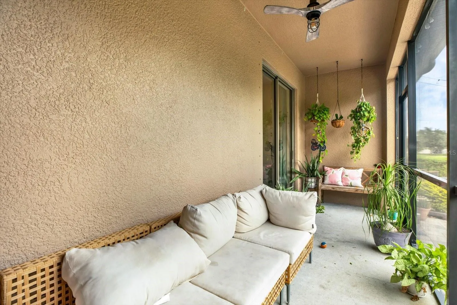 Screened lanai with ceiling fan