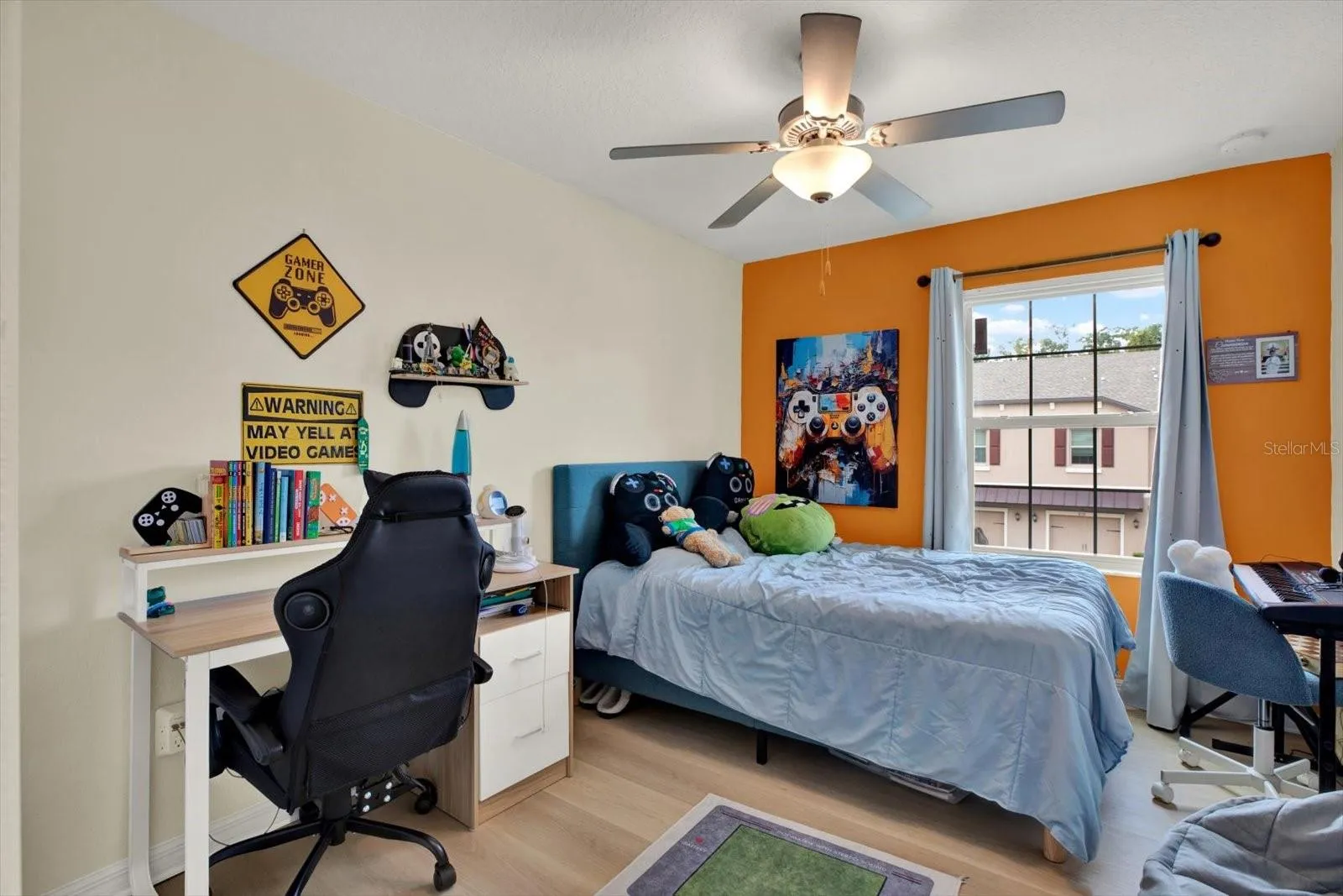 Third floor bedroom with ceiling fan
