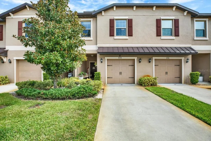 Front of 8538 Reedville St, a townhome in Ventana at Waters Edge