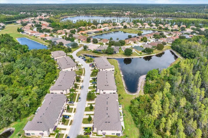 Aerial view of Ventana at Waters Edge with ponds and the lake beyond
