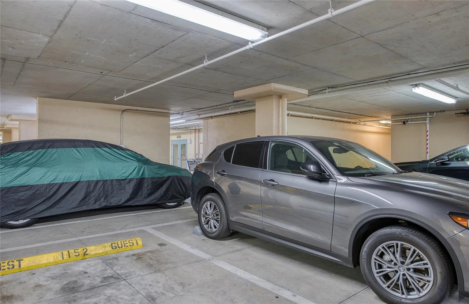 opens to your Assigned Parking Space No. 1153.