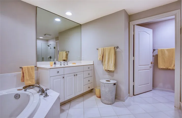 Primary Bathroom has 2 Sinks with Cabinets,