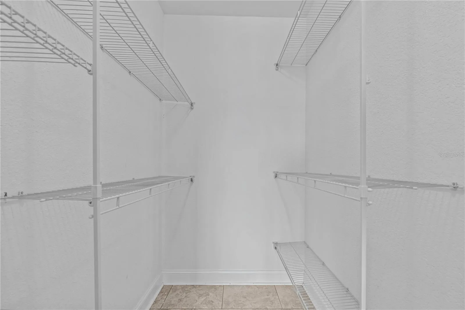 Primary Bedroom Walk-In Closet