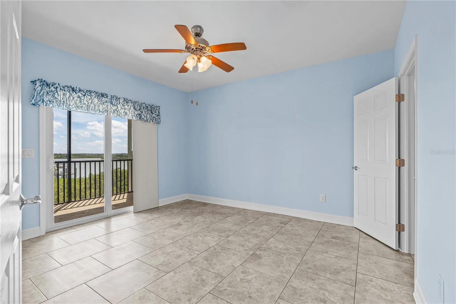Primary Bedroom Suite w/ Balcony Access