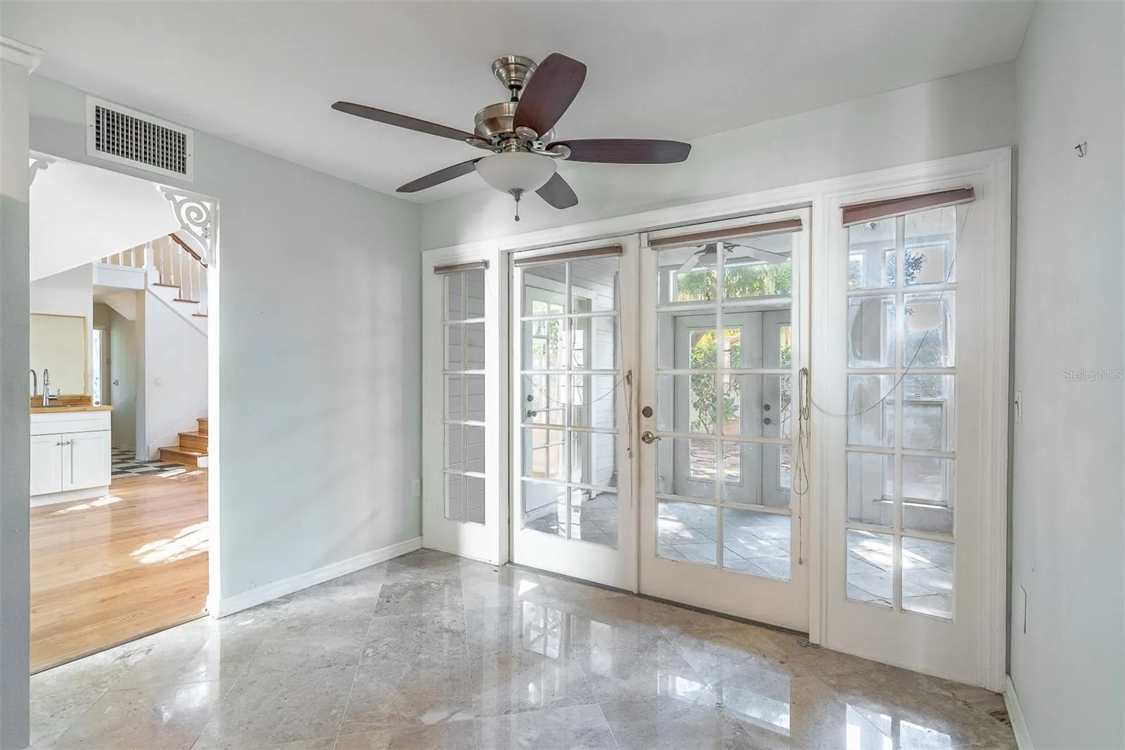 View into sunroom from kitchen