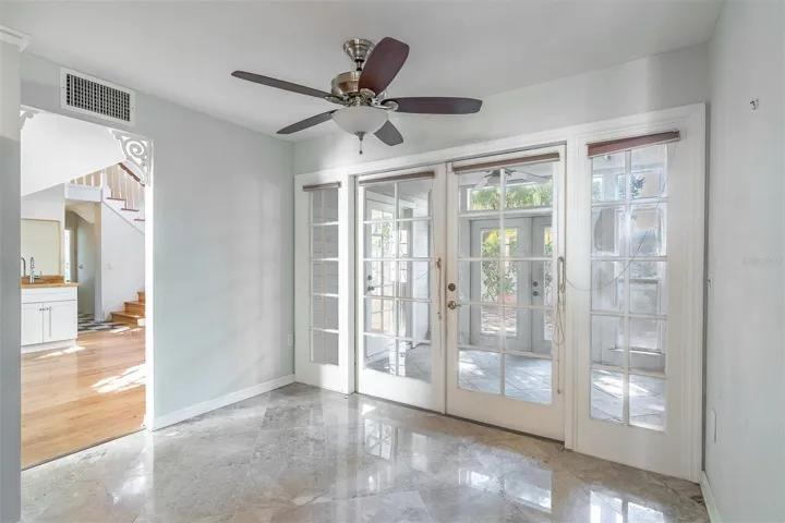 View into sunroom from kitchen