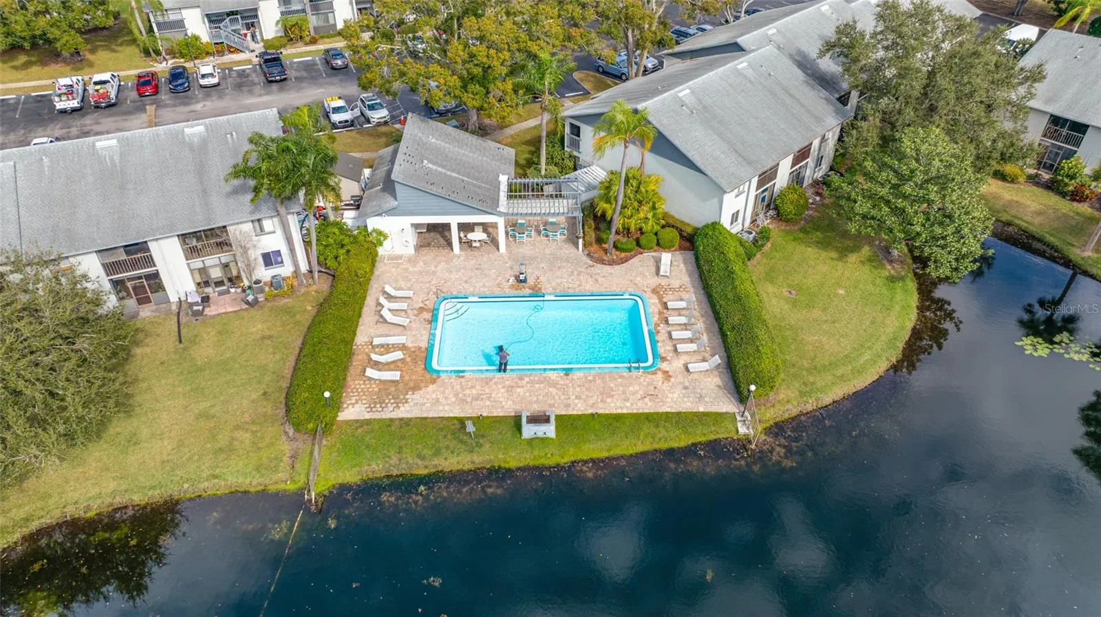 One of two community pools surrounded by peaceful pond views.