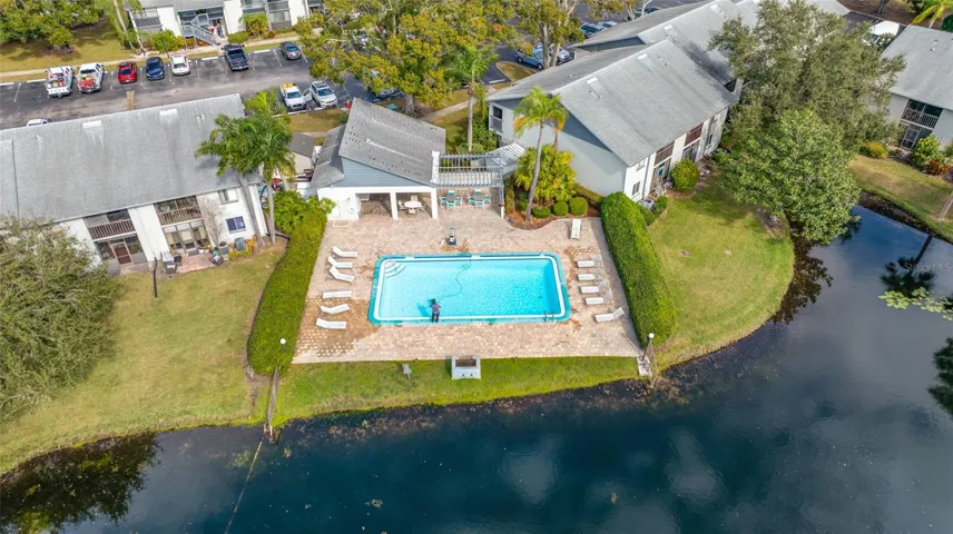 One of two community pools surrounded by peaceful pond views.