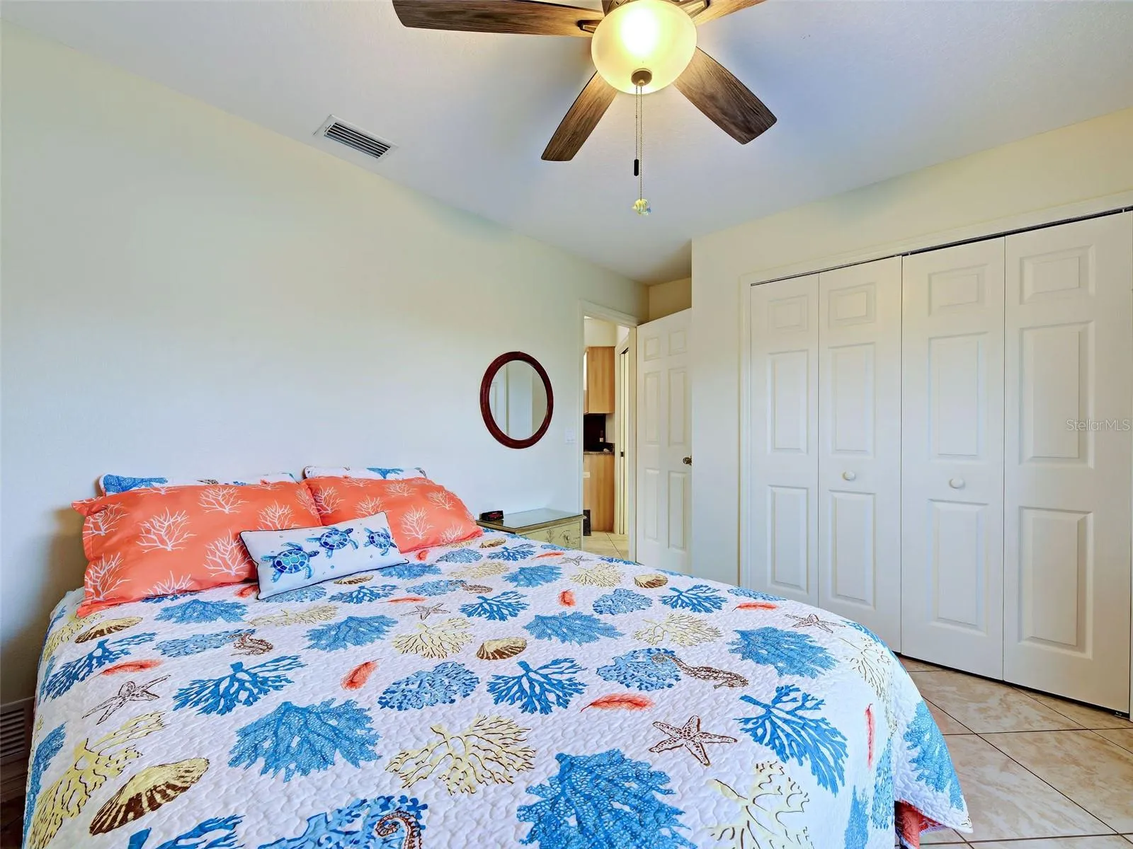One of the two guest bedrooms with a built in closet.