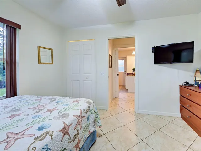 The second guest bedroom with a built in closet.