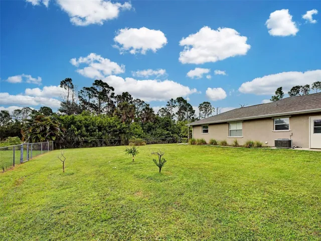 Located on a double lot, there is plenty of space between you and neighbors.