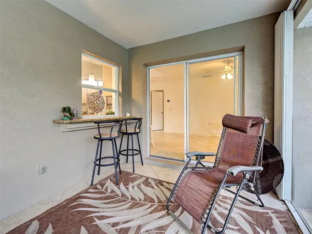 Convenient pass thru from the kitchen to the lanai.  You can step into the family room from the lanai.