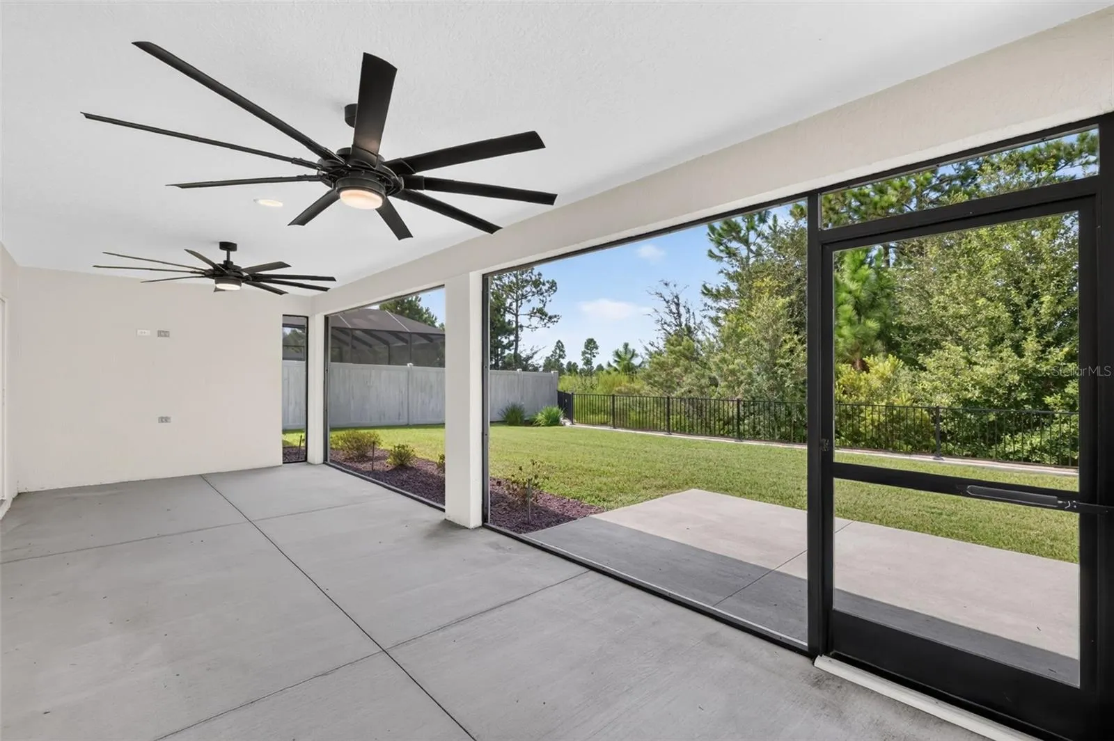 Expansive 28'x11' Lanai with Serene Eagle Preserve Views and PRIVACY Fencing