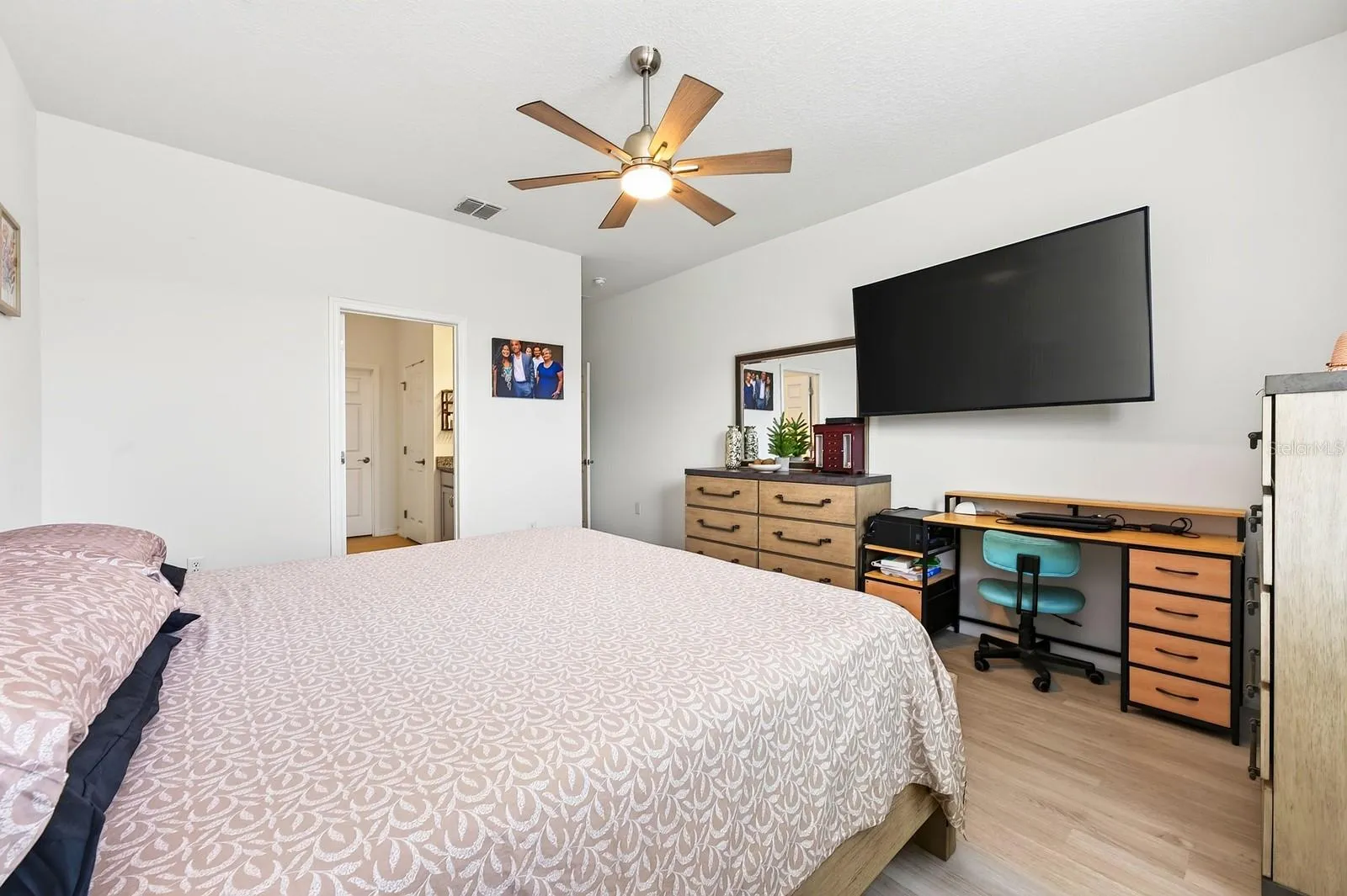 The Primary Bedroom provides a PEACEFUL RETREAT with a private en-suite bath.